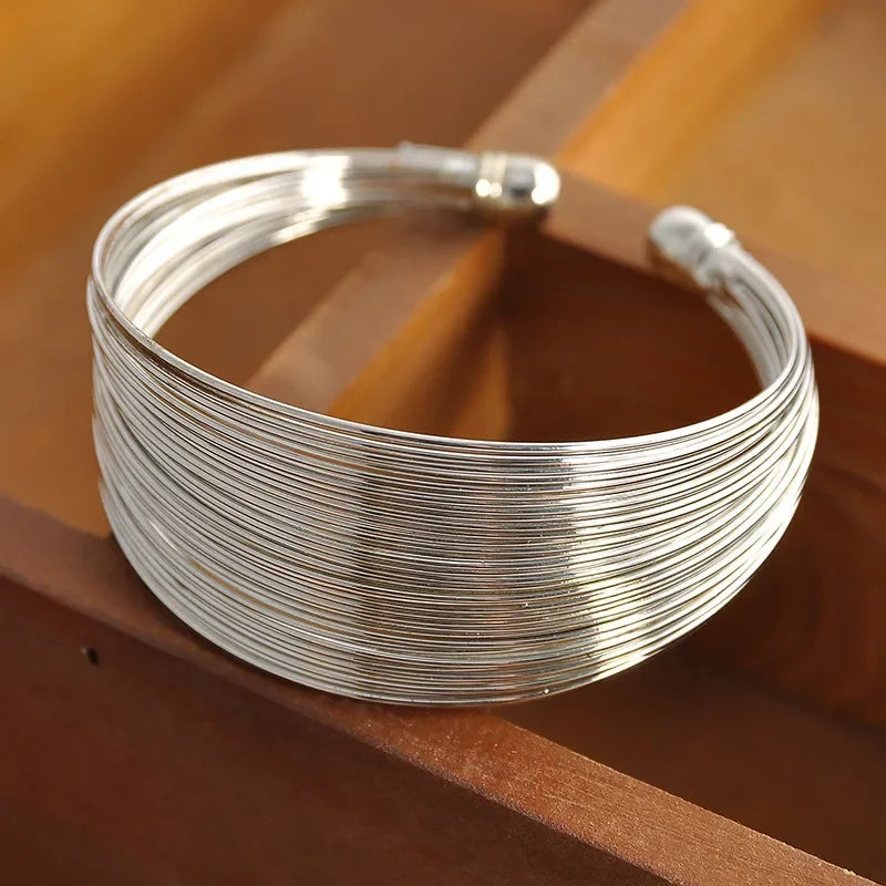 Bracelet large en métal avec ouverture multicouche