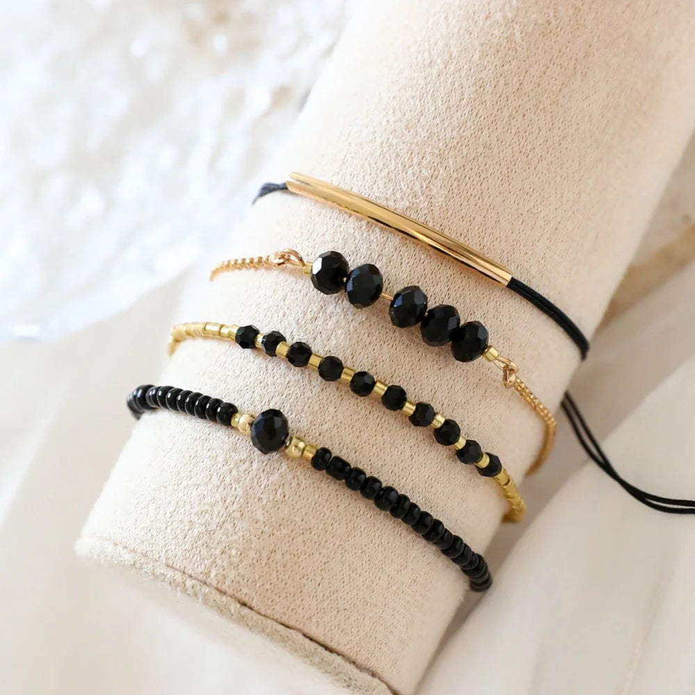 Bracelets en pierre de verre noir