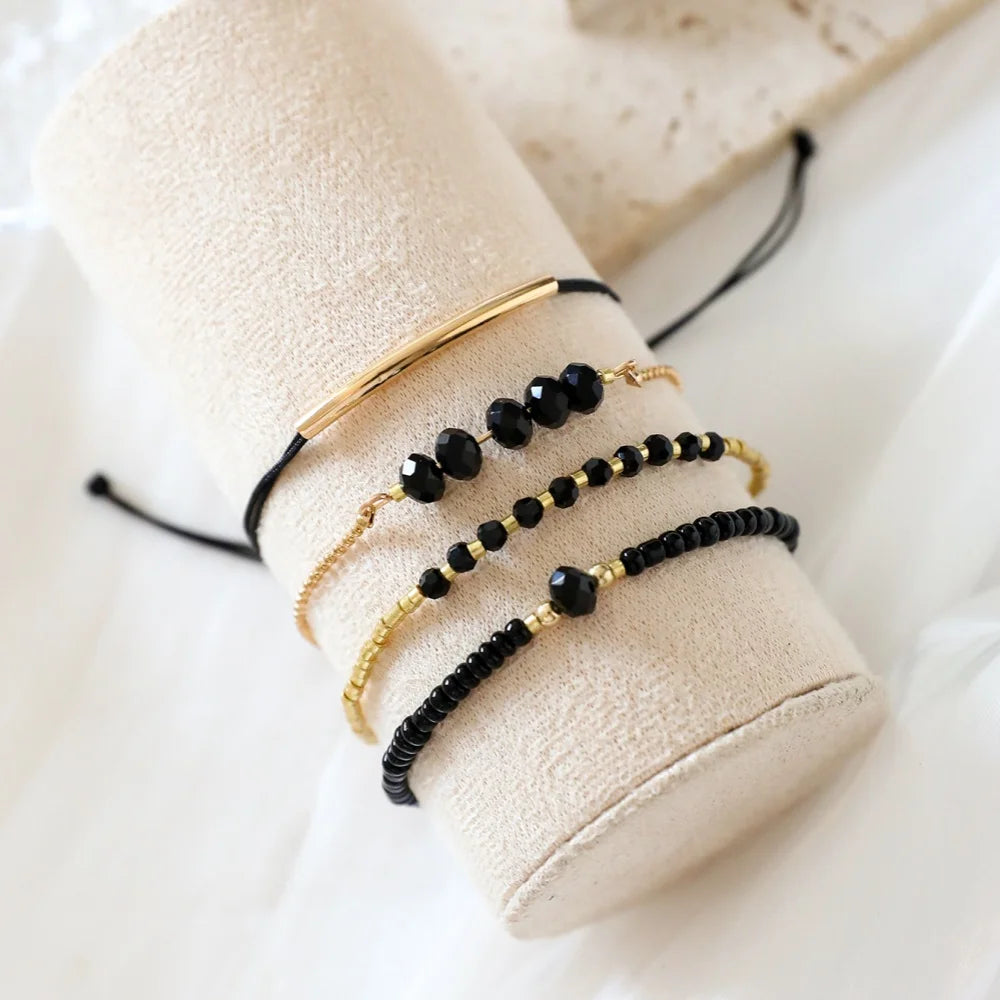 Bracelets en pierre de verre noir
