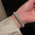 Bracelet pour femme de style antique à motif de fleur à quatre feuilles
