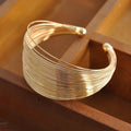 Bracelet large en métal avec ouverture multicouche