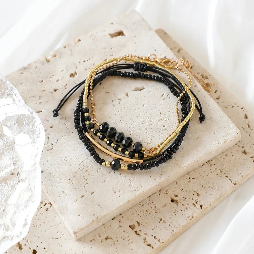 Bracelets en pierre de verre noir