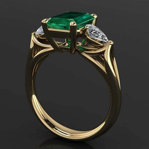 Bague couleur Or avec magnifique émeraude